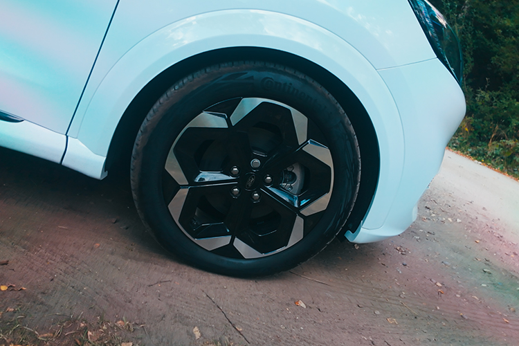  Close up of a White Ford Puma Gen-E's front right alloy wheel